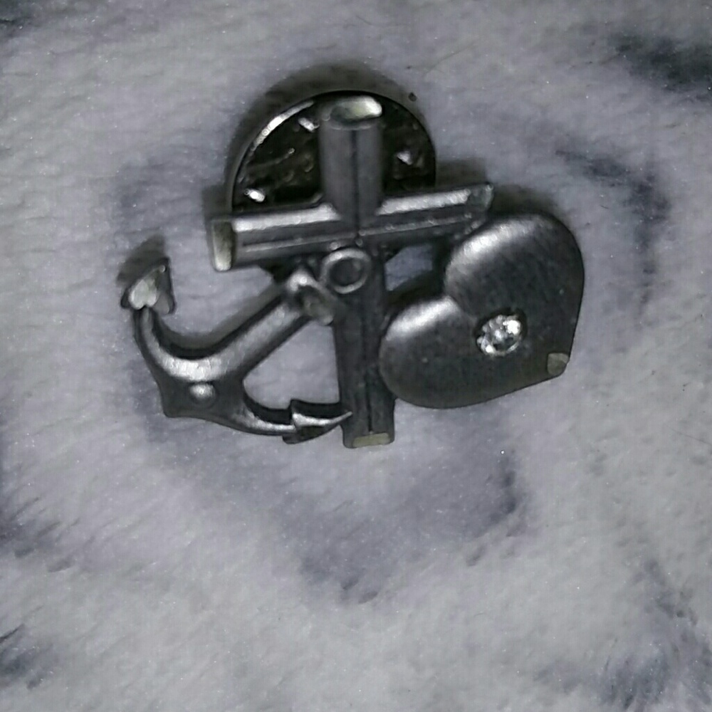 Cross, anchor, and heart pin